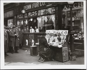 Blind news dealer, Fannie Lyons, at her stand at the south east corner of 7th Avenue & 34th Street