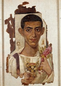 Portrait of Ammonios: representation of a man holding a golden canthara enriched with emeralds and filled with wine that identifies him as Dionysus. In the left hand of golden knights, the garland of roses, symbol of rebirth, near his head