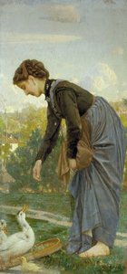Girl feeding a duck