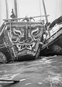 The Highly Decorative Bow of a Hangchow Bay Trader Type Junk Moored with Other Junks at Shanghai by David Watkin Waters