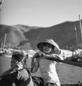 Two young sampan girls at Aberdeen, Hong Kong by David Watkin Waters