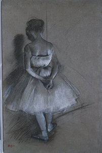 Dancer Standing with Hands Crossed Behind Her Back