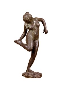 Dancer looking at the sole of her right foot, c1890