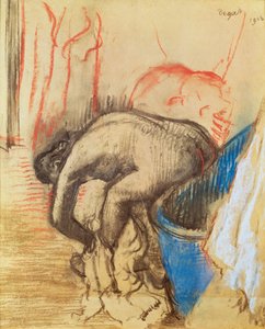 Woman drying her left leg