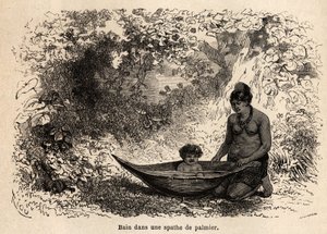 The bath of the child in a palm leaf