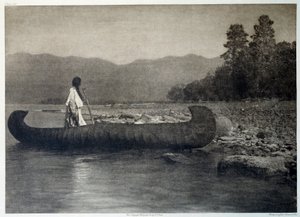 Indians of America: an Indian on a canoe boat in southern Flathead Lake, Montana by Edward Sheriff Curtis