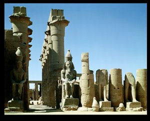 Colosses of Ramesses II and the Pylon of Amenophis III, in the Peristyle Court