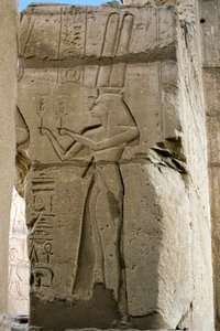 Egyptian antiquity: detail of reliefs depicting the goddess Hathor holding sistrums in her hands, Funeral Temple dedicated to Pharaoh Ramses II, site of Ramasseum in Luxor, Egypt