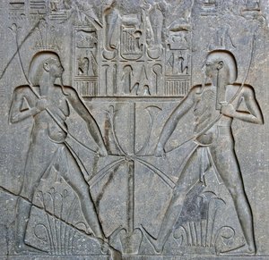 Detail of the base of the statue of Pharaoh Ramses II representing the union of Upper and Lower Egypt. Temple of Luxor, East Bank (Thebes), Egypt by Egyptian 19th Dynasty