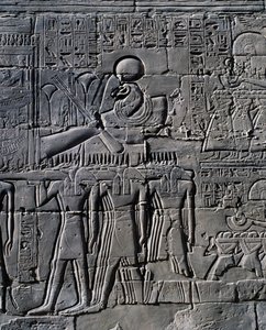 Ramesses II in front of sacred boat, relief, interior walls of Great Hypostyle Hall, Karnak temple complex by Egyptian 19th Dynasty