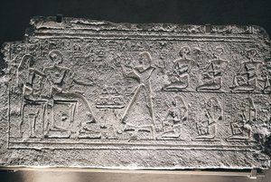 Relief of Ptahotep and Tauseret from Saqqara, the couple receiving offers from their eldest son Amenheb and other children by Egyptian 19th Dynasty