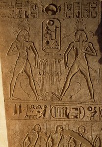 Union between Upper and Lower Egypt and cartouche of Pharaoh, relief on base of thrones, Temple of Ramesses II, Abu Simbel, Egypt, New Kingdom, Dynasty XIX by Egyptian 19th Dynasty