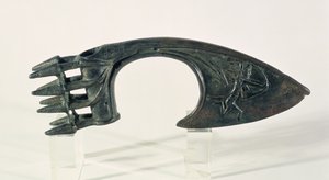 Axe blade depicting an archer, possibly from Lorestan, Iran, late 2nd or early 1st millennium BC