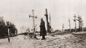A Russian Soldier at the Grave of a Comrade-in-Arms During World War One, from The Illustrated War News, 1915 by English Photographer