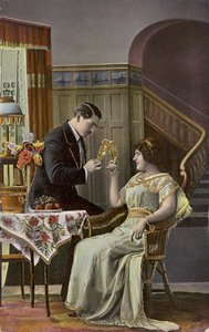 A couple toasting each other