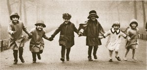 A line of well-dressed children running in Hyde Park, from Wonderful London, published 1926-27 by English Photographer