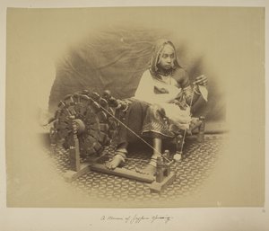 A woman of Jeypore spinning, c.1890