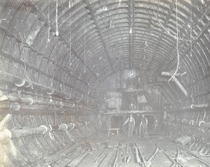 Blackwall Tunnel: Two Men Stand in the Air Lock, 1894 by English Photographer