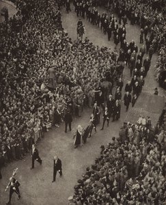 British Prime Minister Winston Churchill and his cabinet walking to the Church of St Margaret, Westminster, for a service of thanks for deliverance from the threat of invasion by Nazi Germany, 8 May 1945 by English Photographer