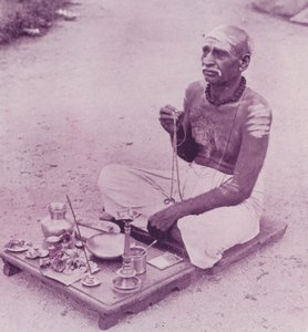 Hindu Priest at his Devotions