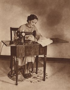 Housewife at Work on the Sewing-Machine by English Photographer
