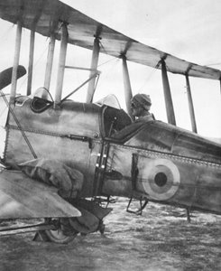 How Kut Garrison was fed by flying-machine: ready for flight with bags of grain by English Photographer