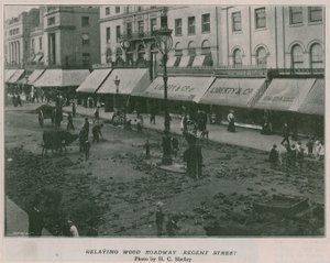 Relaying wood roadway Regent Street by English Photographer