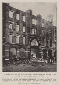 The Great Fire in the Harrow Road, Firemen playing on the Ruins on the Day after the Conflagration by English Photographer