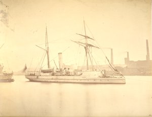 The starboard side of the gunboat Delta moored in the River Tyne, c.1876 by English Photographer