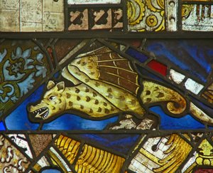 A panel in the east window depicting a dragon by English School