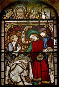 A panel in the east window depicting the Works of Mercy: clothing the naked: also some fine reset heads by English School