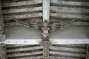 View of one of the carved wooden angels in the nave by English School