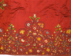 (detail) of an important skirt or petticoat of crimson silk said to have been embroidered by Mary, Queen of Scots for Queen Elizabeth I while she was captive at Hardwick