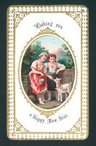Girls feeding goat by English School