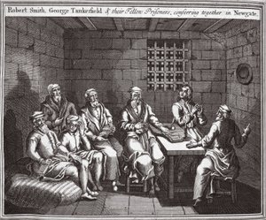 Robert Smith, George Tankerfield and their fellow prisoners, conferring together in Newgate, illustration from Foxe
