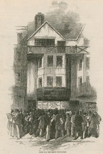 Rush for the daily newspaper at the office of the Daily Telegraph by English School