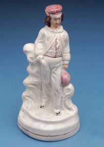 Staffordshire figure of a Rugby School boy (ceramic)