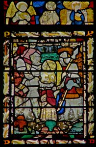 The east window depicting the arrest of St John, angel musician, Virgin & Child, and another Virgin in the canopy by English School