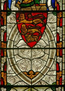Window Ew depicting arms of England and grisaille by English School