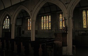 Window depicting a view of the north aisle with fifteenth century stained glass windows