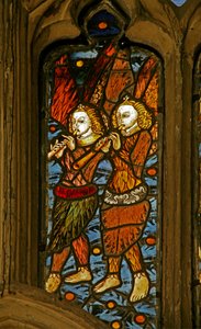 Window depicting musician angels with oboes by English School