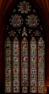 Window depicting the Chapter House east window; rest panels by English School