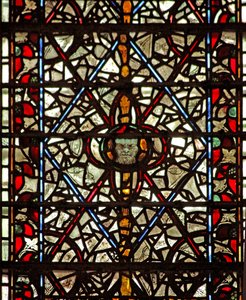 Window W59 depicting grisaille and a head by English School