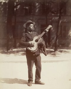 Guitar player, Paris by Eugène Atget