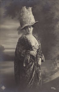 Attractive young woman, wearing a strange hat by European Photographer