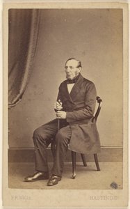 Unidentified elderly man with beard sans moustache, seated