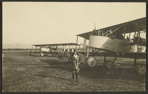 Man in Front of Airplane by Fedele Azari