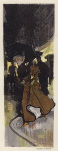 Woman walking on a rainy street at night