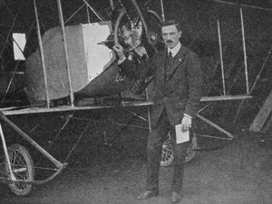 One of the Best Instructors: Lewis W.F. Turner Standing by a Caudron Training Biplane