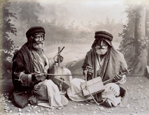 Portrait of Two Arab Musicians in Humble Ethnic Dress by Félix Bonfils